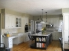 After picture oak cabinets with black island