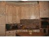 Nantucket white with van dyke brown glaze on knotty alder cabinets
