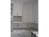Right white bead board maple cabinets