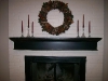 Black distressed fire mantel